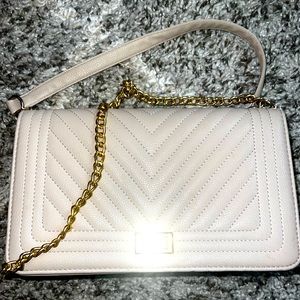 Cream women’s purse mid size